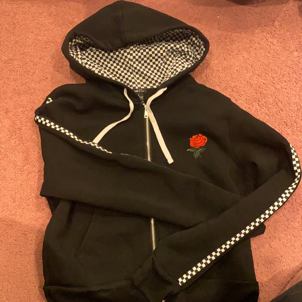 Black with checkered design zip up
